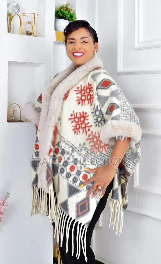 Elegant Ponchos With Fur and Beautiful Prints - thumbnail 9
