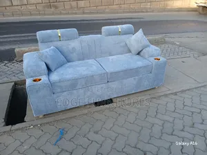Grey Cupped Three Seater Sofa