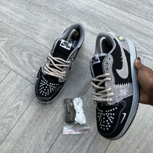Nike Air Jordan 1 Low Og "Voodoo" Sneaker.