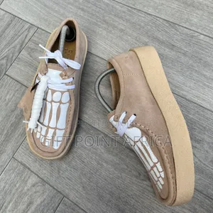 Clarks Originals Wallabee Boots Featuring a White Skeleton