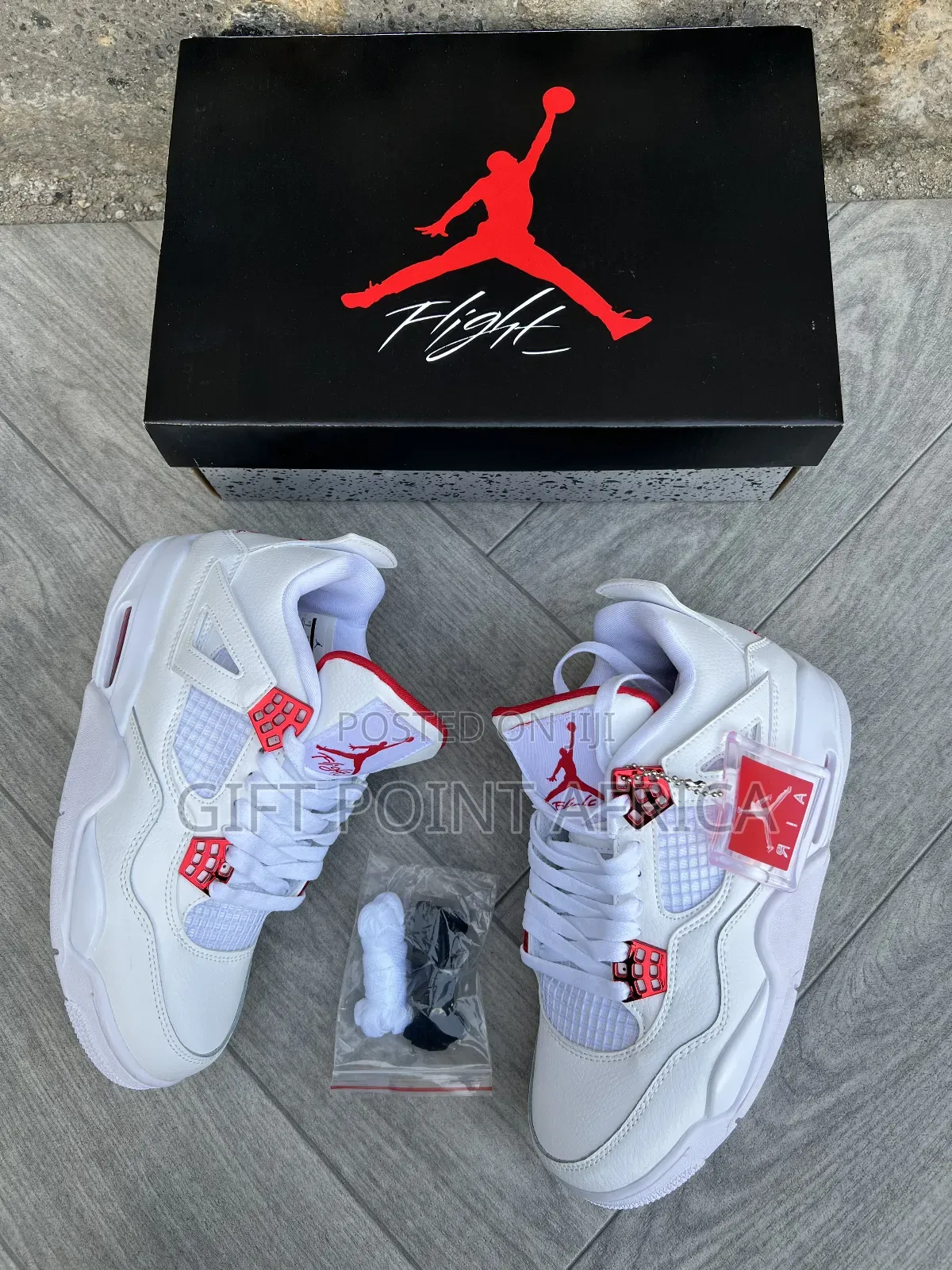 Nike Air Jordan 4 Retro Metallic Red, a Sneaker