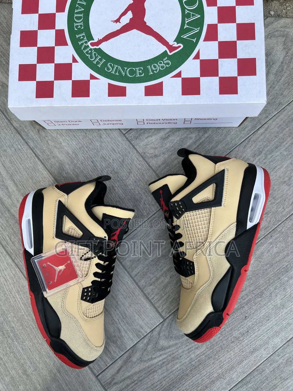 Nike Air Jordan 4 Retro "Pizza" Sneakers.