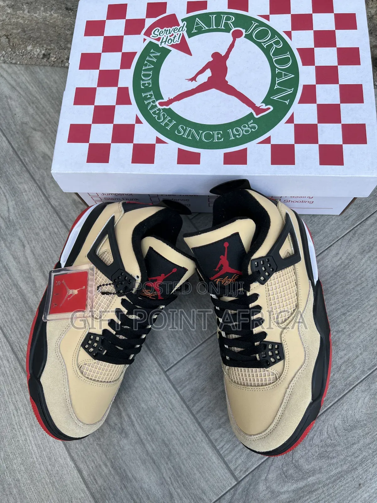Nike Air Jordan 4 Retro "Pizza" Sneakers.