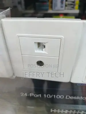 Wall Faceplate Integrates Lan (Ethernet) Socket and a Tv Coaxial