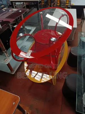 Red Oval Glass Coffee Table