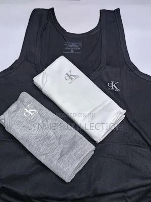 3 Calvin Klein Cotton Vests