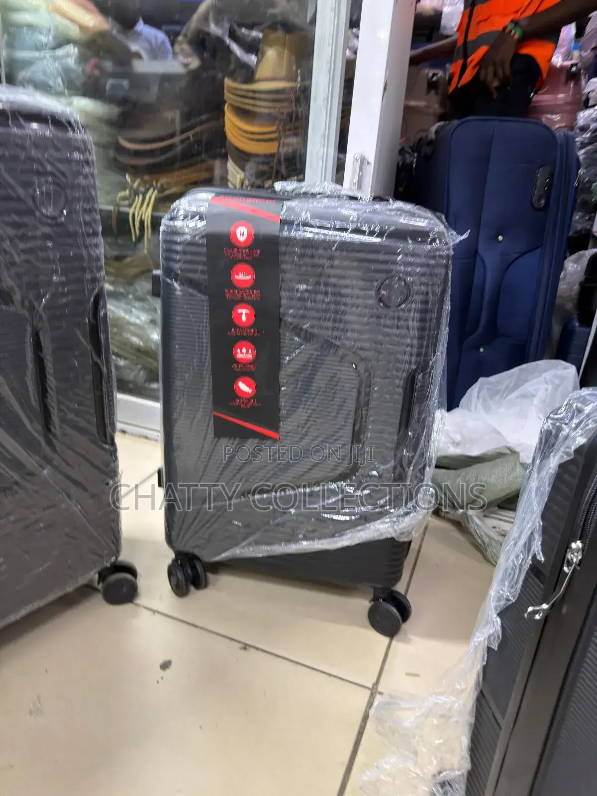 Black Medium Size Rubber Unbreakable Suitcase Height 57cm