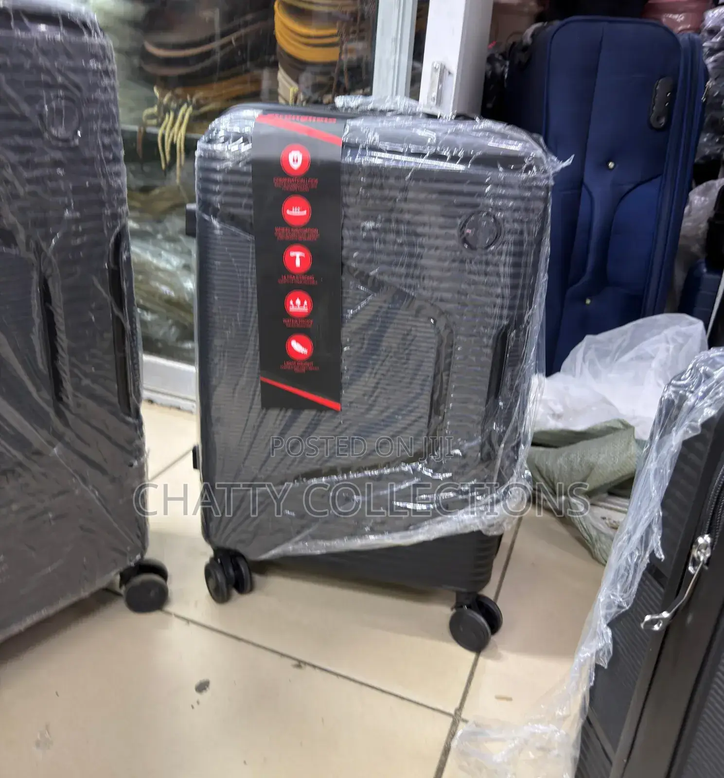 Black Medium Size Rubber Unbreakable Suitcase Height 57cm
