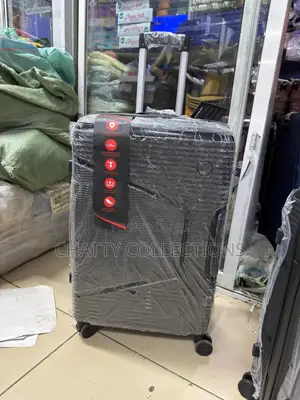 Black Large Rubber Suitcase 
Height 63cm
Capacity 23kgs)