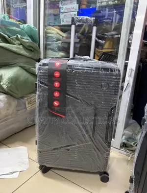 Black Large Rubber Suitcase 
Height 63cm
Capacity 23kgs)