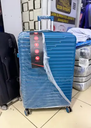 Turquoise Xl Rubber Suitcase 
Height 75cm (Capacity 32kgs)