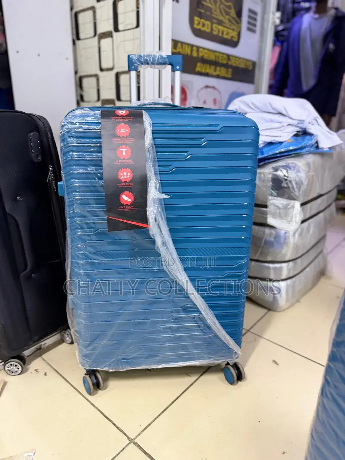 Turquoise Xl Rubber Suitcase 
Height 75cm (Capacity 32kgs)