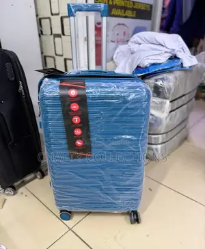 Turquoise Medium Rubber Suitcase Height 69cm