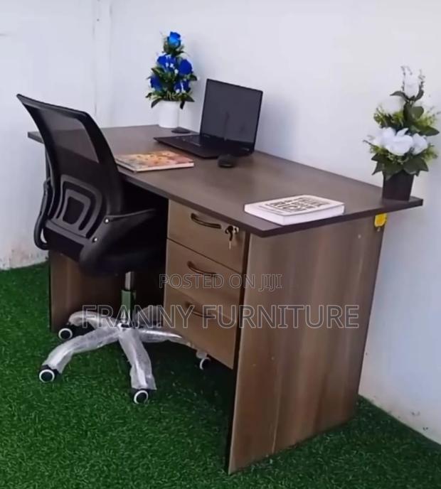 Brown Office Desk With a Matching Chair