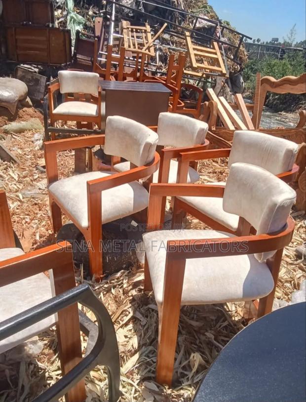 Dining Chairs With Cream Upholstery, Custom-Made With Mahogany Wood.