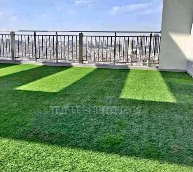 Enjoy a Greenery Rooftop Outdoor Artificial Grass Carpet
