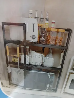 A Black Microwave Oven Storage Rack