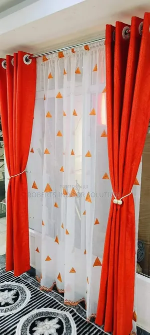 Orange Blackout Curtains Paired With Sheers