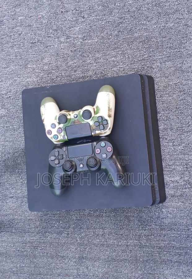 Ps4 Slim Chipped With 7 Games and 2 Pads