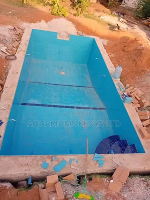 Blue Tiled Swimming Pool Construction – Professional Pool Contractor