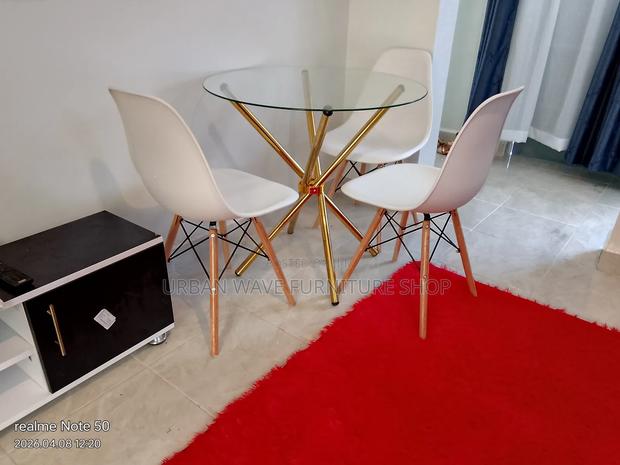 Transparent Tables and White  Eames Chair