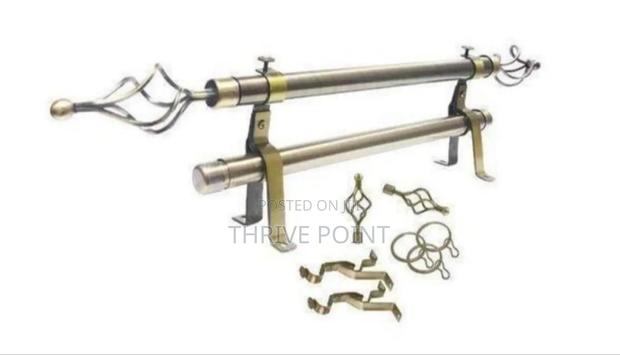 *Double Adjustable Curtain Rod Set in an Antique Brass - main view