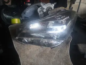 Toyota Vitz Ksp130 Left Headlight 2010–2017 Original Ex-Japan
