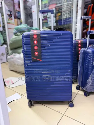 Xl Bblue Rubber Suitcase at 4500