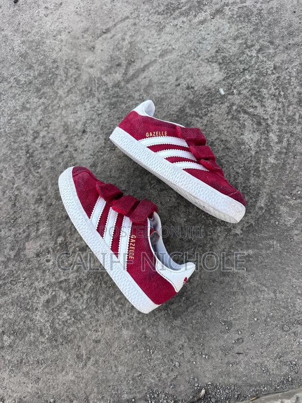 Clean Red Gazelle Size 29(Kids) Mtumba