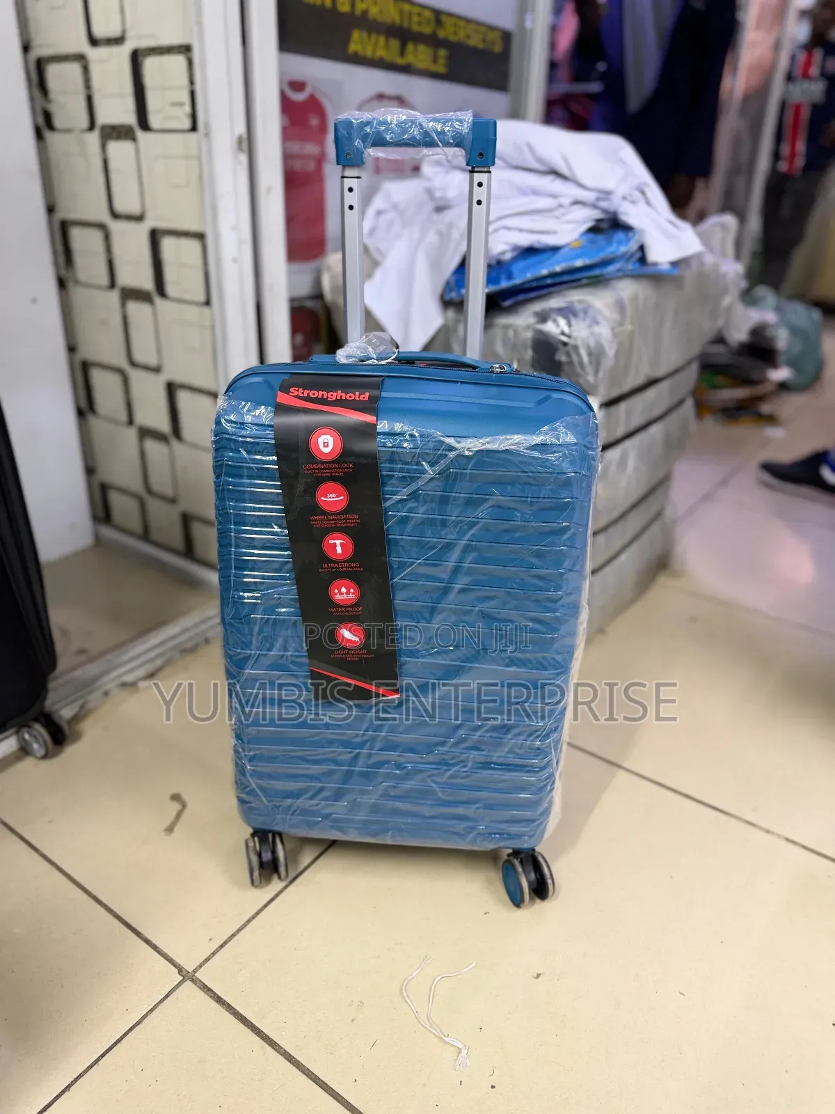 Small Suitcase in Blue Rubber Unbreakable Height Each 59cm at 2000 KSH