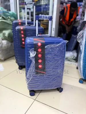 Small Suitcase in Blue Rubber Unbreakable Height Each 59cm at 2000 KSH