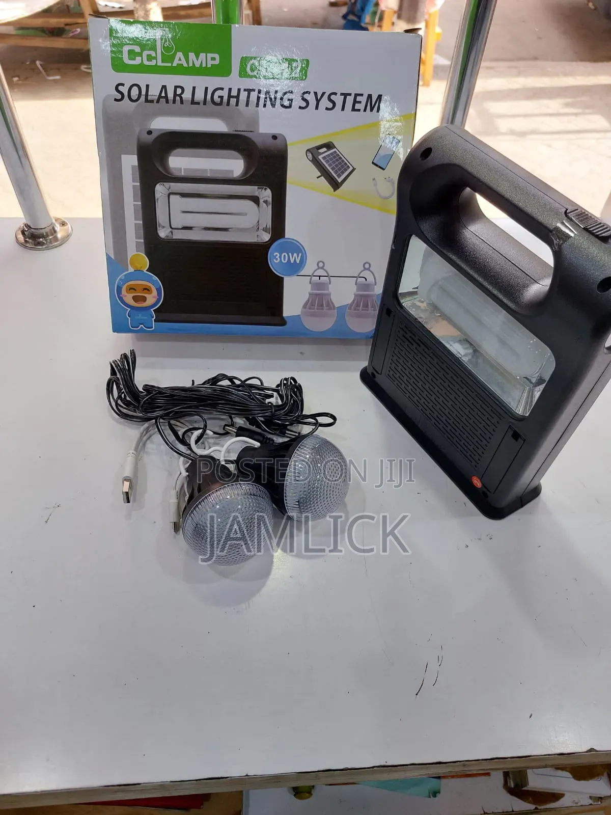 CCL Cl12 Solar Lamp (2 Bulbs + Side Panel + Phone Charger) - Eg