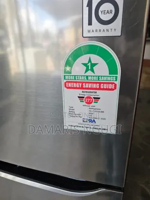 Top Freezer Lg Fridge (Good as New )