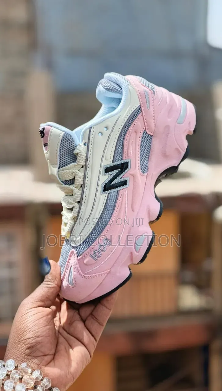 Ladies Pink New Balance 1000 Sneakers