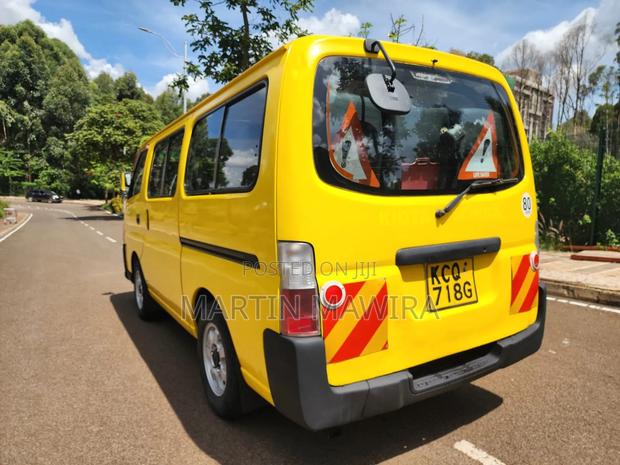 Nissan Caravan (Urvan) 2011 Yellow - thumbnail 8