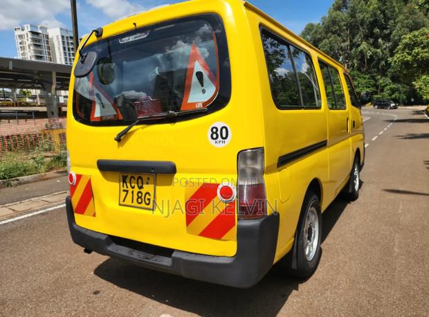 Nissan Caravan (Urvan) 2011 Yellow - thumbnail 7