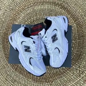 Black and White Unisex New Balance Sneakers Size 36 to 45