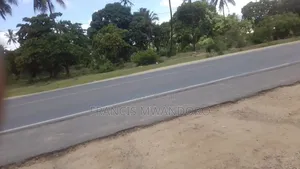 11 Acres at Tezo Touching Msa, MLD Highway.