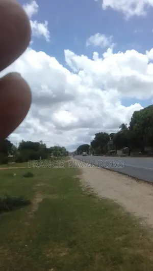11 Acres at Tezo Touching Msa, MLD Highway.