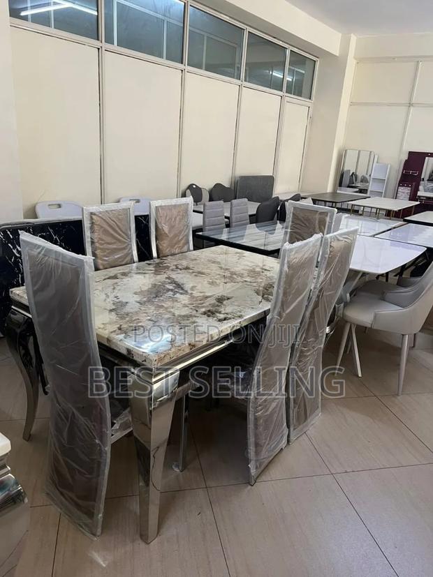 Gray Luxurious Dining Table and Chairs