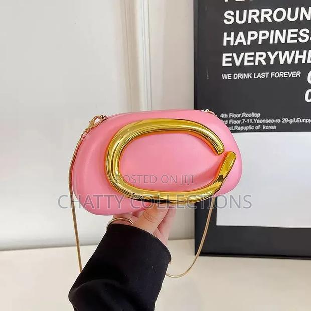 Pink and Gold Ladies Clutch Bags With Sling