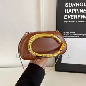 Brown and Gold Ladies Clutch Bags With Sling