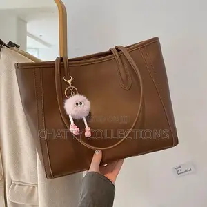 Dark Brown Ladies Leather Tote Bags With Doll Hang