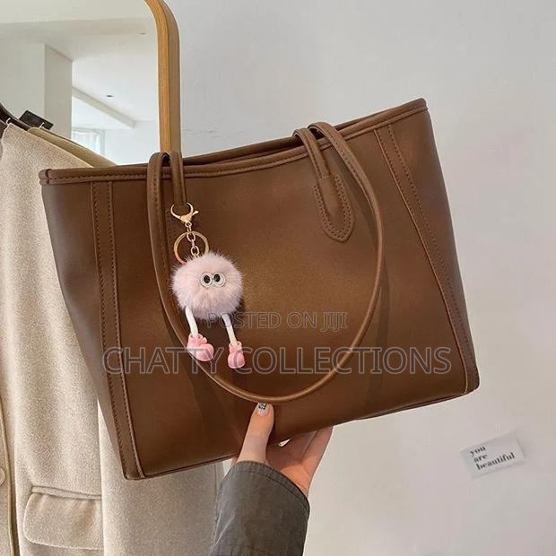 Dark Brown Ladies Leather Tote Bags With Doll Hang