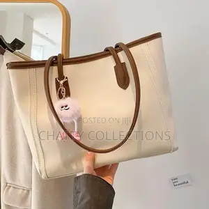 Cream White Ladies Leather Tote Bags With Doll Hang
