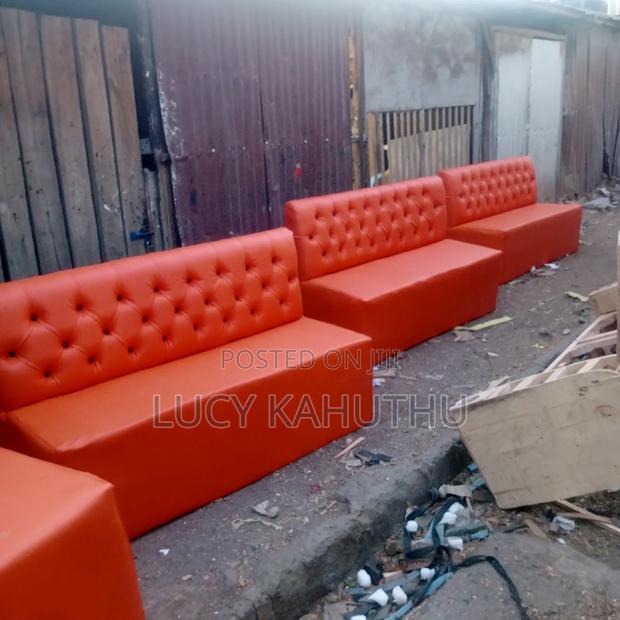 Orange Couches With Black Buttons - thumbnail 2