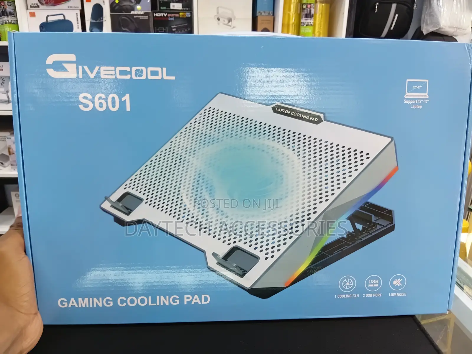 Height-Adjustable Laptop Cooling Pad With RGB Lighting One Large Fan.