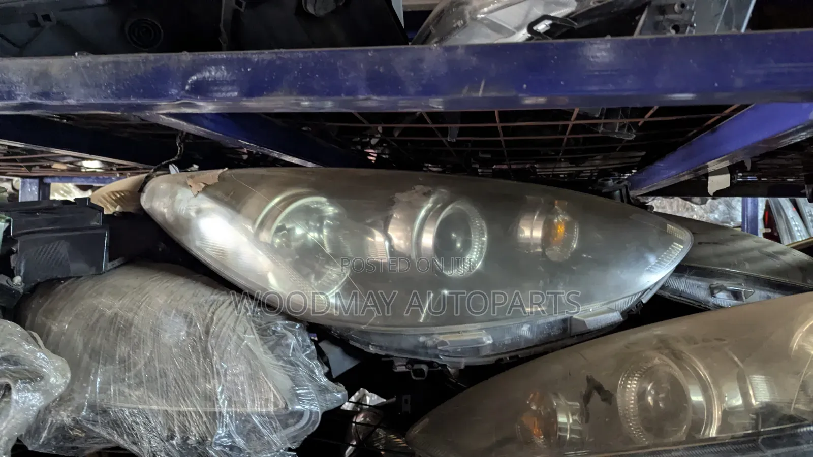Mazda Demio Headlight