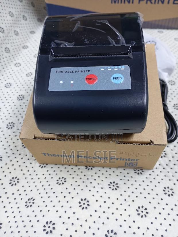 Smart Bluetooth Receipt Printer – Portable Inkless Printing - main view