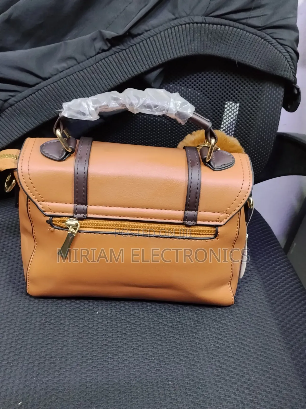 Brown Sling Handbag on Offer